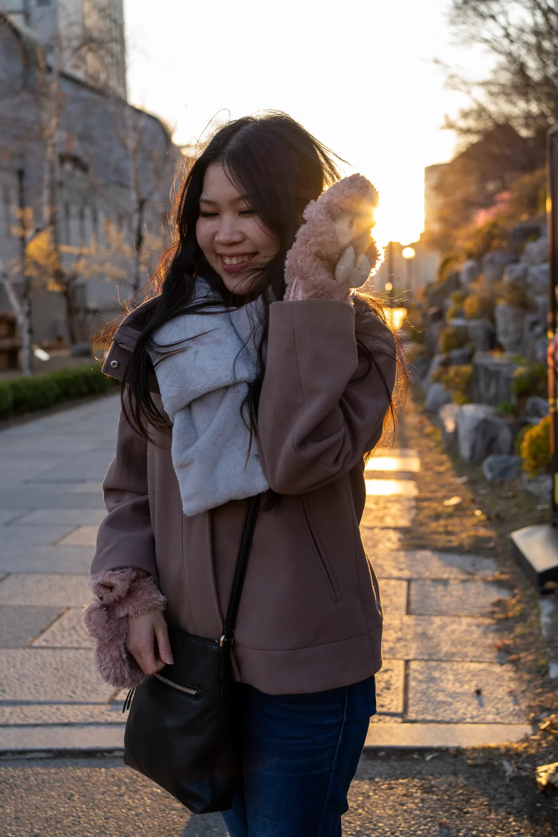 Gail smiling in warm winter evening light.