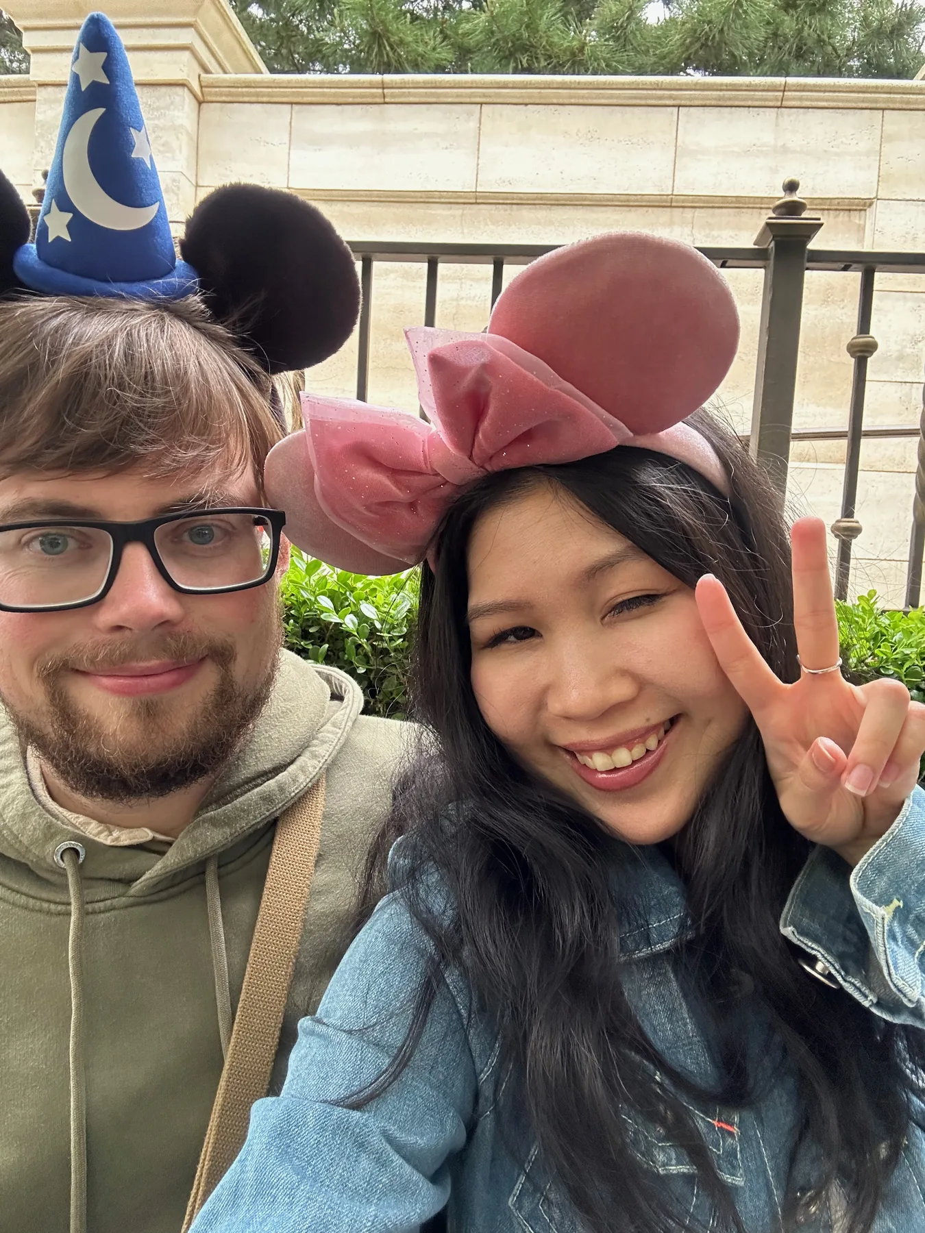 Lewis and Gail taking a close selfie in character ears.